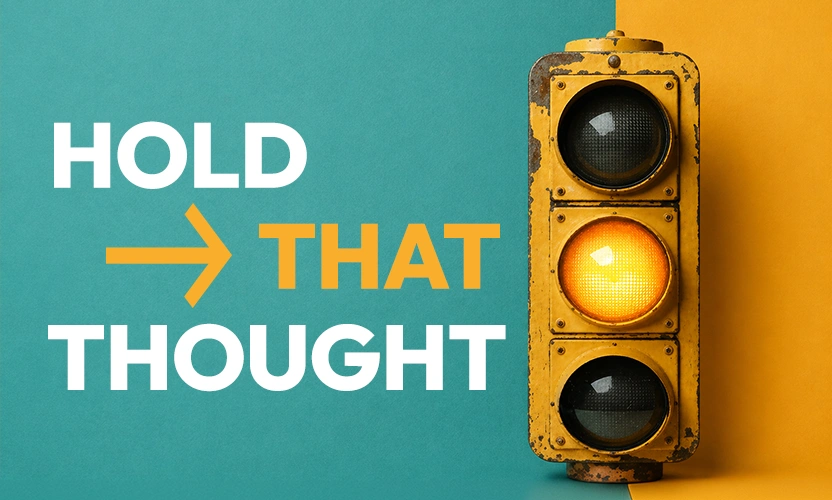 Amber traffic light representing a pause for creative thinking and new marketing ideas